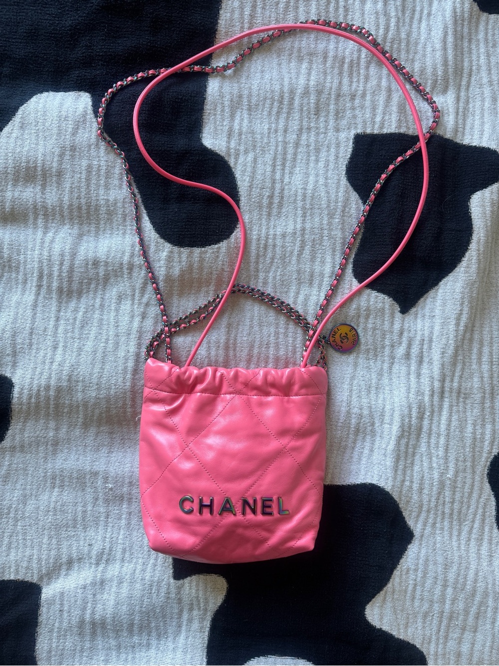 CHANEL Pink Quilted Drawstring Pendant Bag